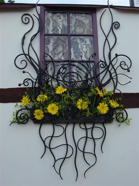 Railings & Banisters | Wrought iron window boxes, Wrought iron decor ...