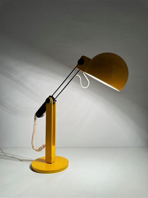 Tramo Large Swivel yellow table lamp by Miguel Milá For Sale at 1stDibs