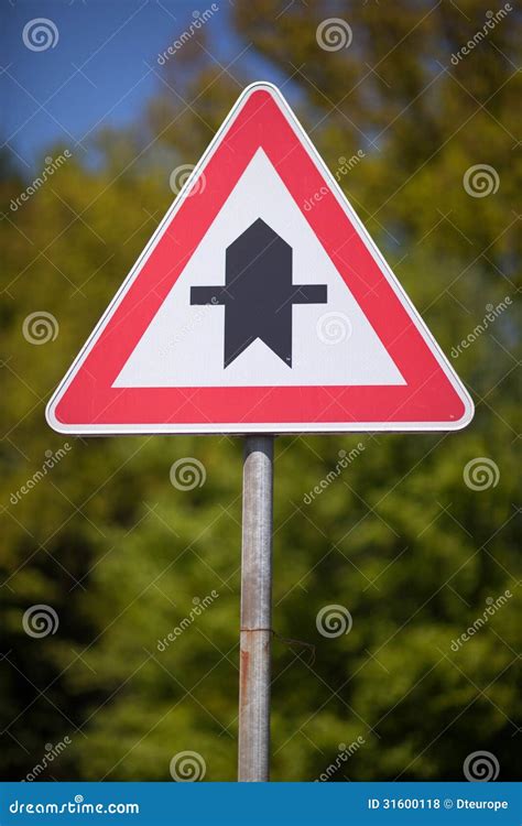 Triangular Traffic Sign for a Crossroads Stock Photo - Image of ...