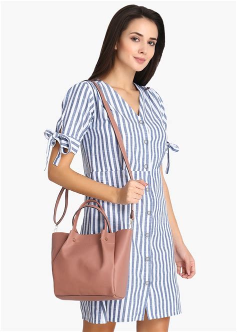 Get Solid Textured Mini Handbag at ₹ 995 | LBB Shop