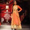 A model showcases a creation by designer JJ Valaya during India Bridal ...