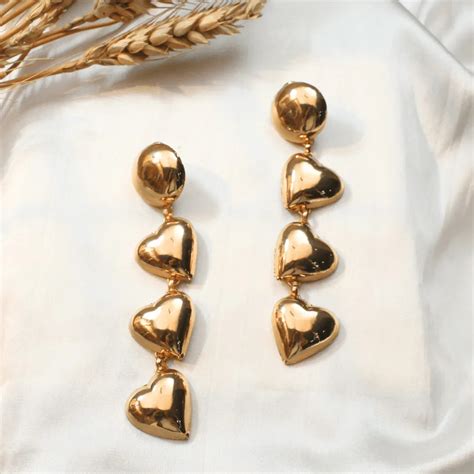 TFC Bold Heart Sway Gold Plated Dangler Earrings