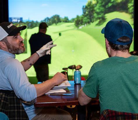 Group having fun at Stonehedge Indoor Golf
