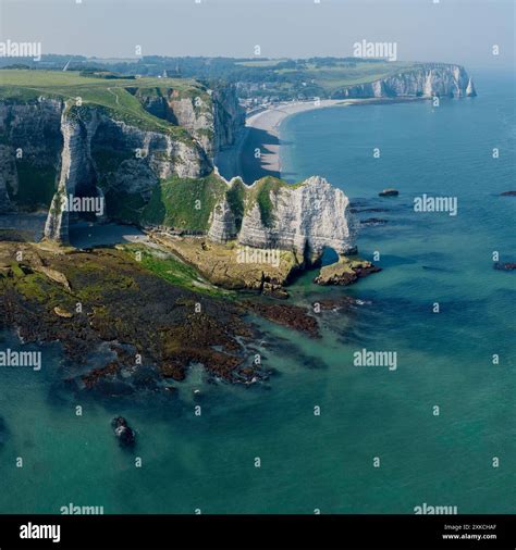 Aerial view of Etretat cliffs and the Atlantic ocean. Chalk cliffs and ...