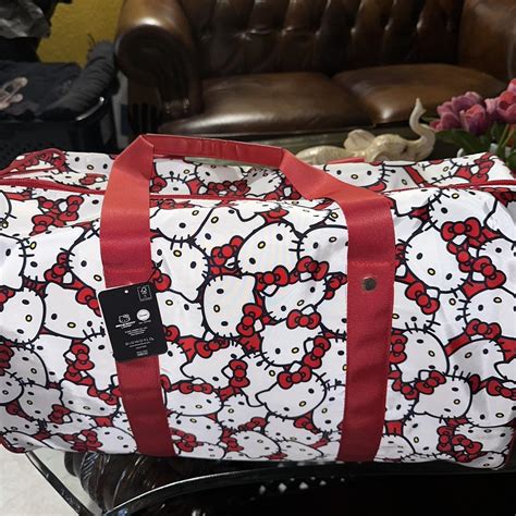 NTW HELLO KITTY DUFFLE BAG #hellokitty #Sanrio... - Depop