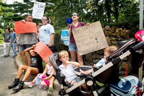 PHOTOS: Crowd protests indoor school mask mandate at Murphy’s home - nj.com