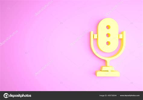 Yellow Microphone icon isolated on pink background. On air radio mic ...