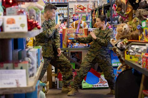 Janel Parrish and Parker Young on Hallmark's Christmas on Duty (Exclusive)