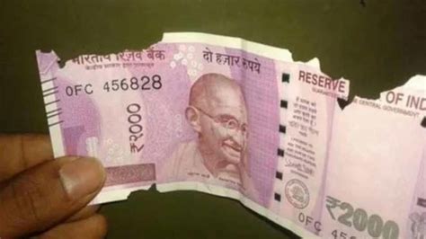 जानें कटे-फटे नोटों को बदलने के बारे में क्या कहता है RBI | rbi ...