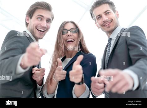 Group of People Standing in Office Pointing 的图像结果