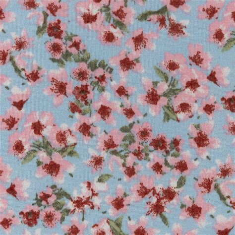 Fabric Merchants Pink Flowers on Blue Double Brushed Stretch Fabric ...