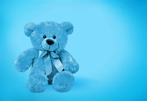 Download A Blue Teddy Bear On A Blue Background | Wallpapers.com