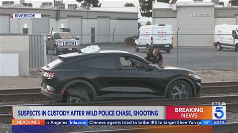 2 arrested after wild pursuit ends on railroad tracks – KTLA