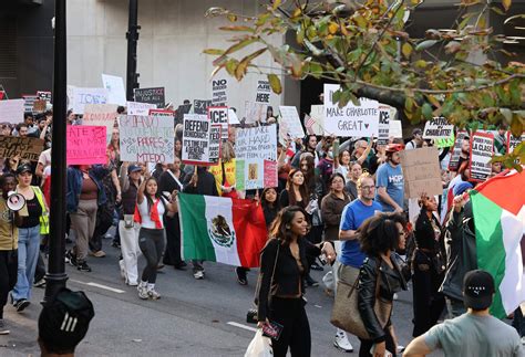 Hundreds march in Charlotte against Border Patrol operations ...