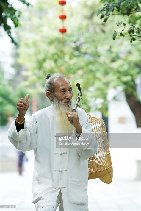 Elderly Man Wearing Traditional Chinese Clothing Carrying Bird Cage ...