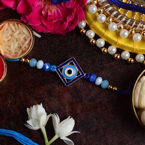Buy Rhombus Evil Eye Rakhi Online in India - Mypoojabox.in