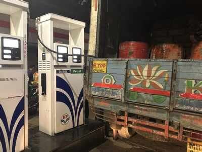 Truck filling diesel in drums on petrol pump - The Times of India