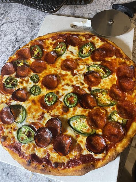 Thinnest crust I’ve made so far : r/Pizza