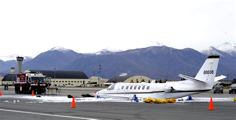 Aircraft performs gear up landing at Elmendorf Air Force Base, Alaska ...