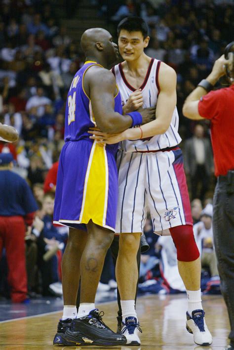 Photo of Yao Ming making Gary Player look like a small child - Business ...