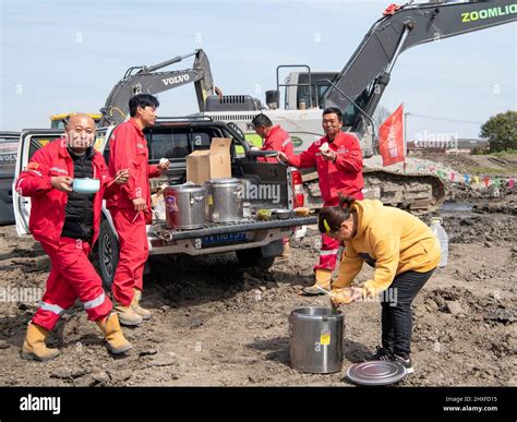 HAIAN, CHINA - MARCH 12, 2022 - Workers work at the construction site ...