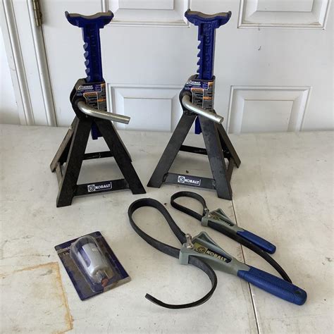 G879 KOBALT Heavy Duty Jack Stands , Strap Wrenches | EstateSales.org
