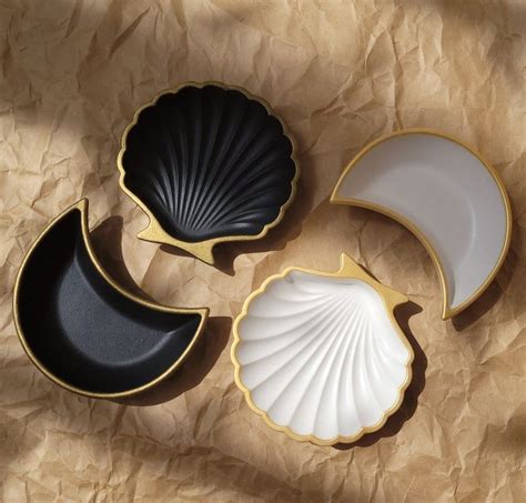 Three Seashells on Paper