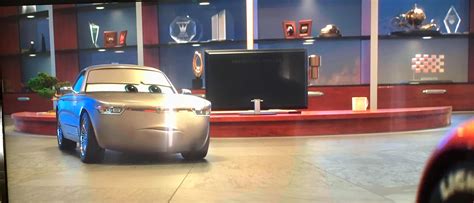 In Cars 3, when McQueen is talking to Mr. Sterling about his future, we can see in the top right ...