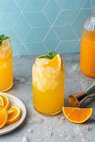 Image result for Cocktail Garnished with Orange and Cherry