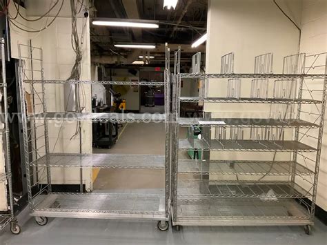 Metal racks on wheels - lot of 2 | AllSurplus