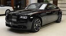rolls royce black badge wraith rolls royce wraith black badge has a orangy interior rolls royce black badge wraith rolls royce wraith black badge has a orangy interior