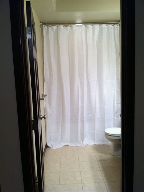 Why Long Curtains Are the Secret to a Stunning Home - length of shower curtains