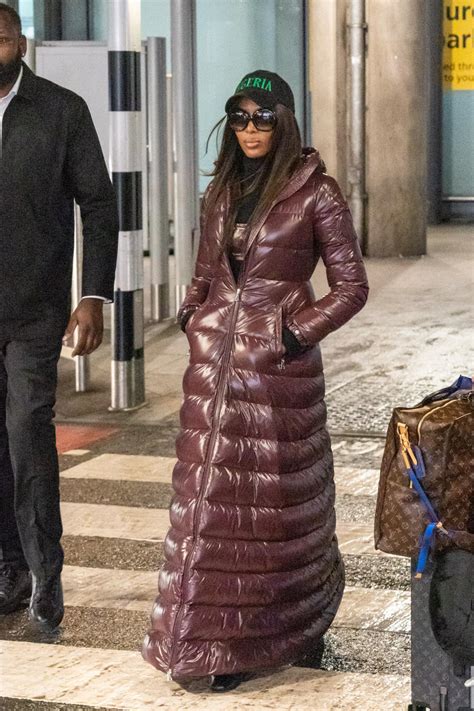 Naomi Campbell wears $4K floor-length puffer coat to the airport