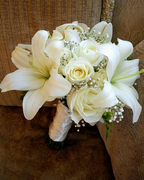 White Casablanca Lilies, White Roses, White Freesia, White Gypsophila ...