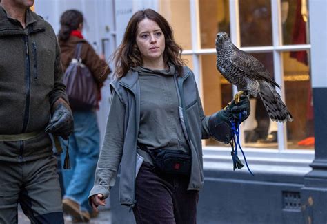 In pictures: The Crown star Claire Foy films H is for Hawk with goshawk on streets of Cambridge
