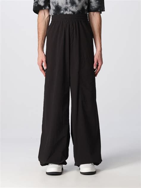 OFF-WHITE: Pants men - Black | Off-White pants OMCA238F22FAB002 online ...