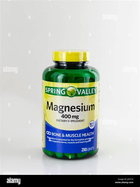 A bottle of Spring Valley brand 400 mg Magnesium supplement. Isolated ...