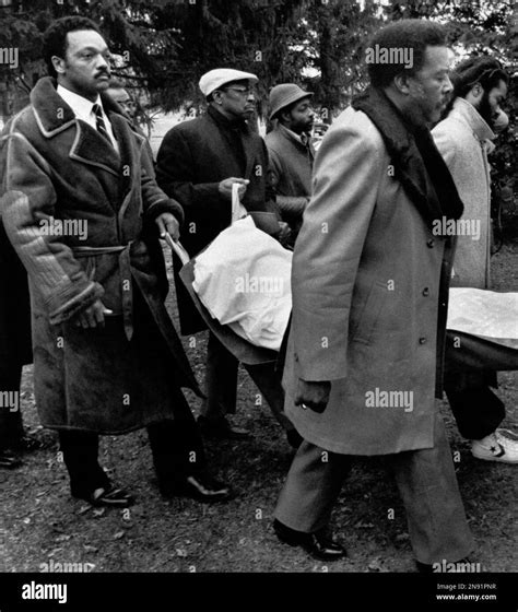 The Rev. Jesse Jackson, left, serves as one of the pallbearers as the ...