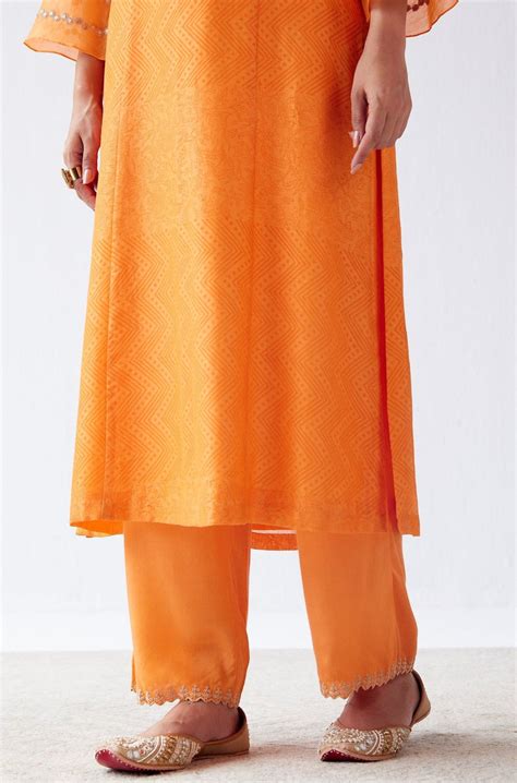 Devnaagri - Pooja Hegde in Orange Block Print Embroidered Kurta Set