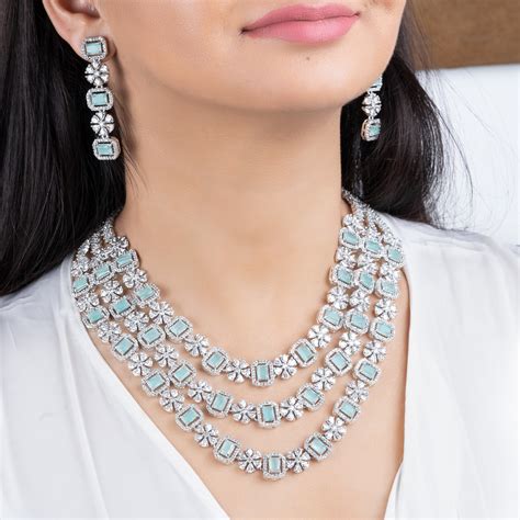 Buy Estele Rhodium Plated CZ Magnificent Three Layered Necklace Set ...