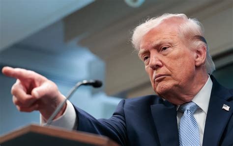 FBI warns of Iranian threat as Trump downplays risk
