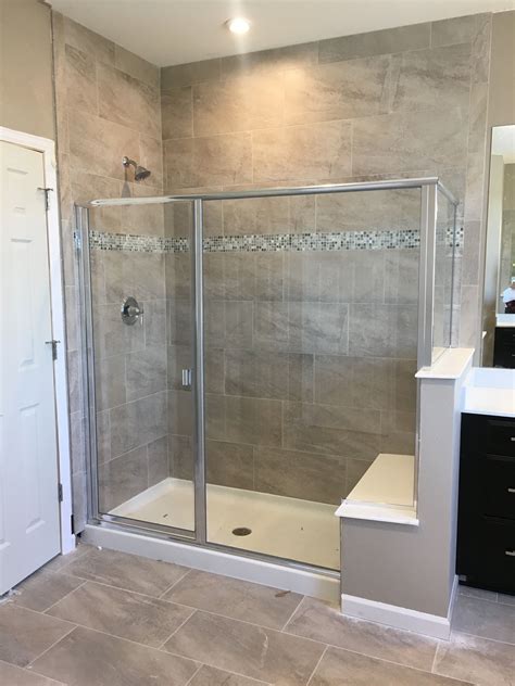 Emser Trovata 12x24" staggered on shower & floor. 4" horizontal row of ...