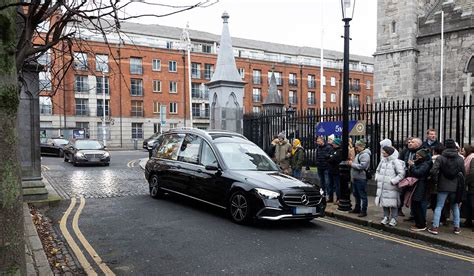 Heartbroken family and friends atttend the funeral of the one and only ...