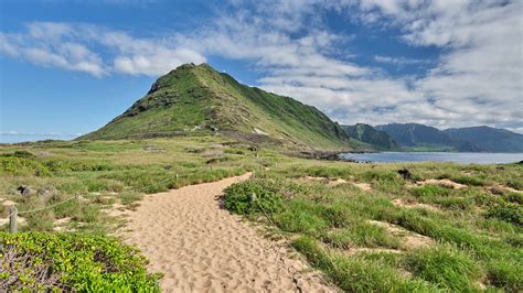 Download wallpaper 2560x1440 mountain, slope, sand, grass, trail, sky ...