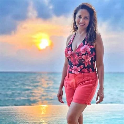 Madhuri Dixit makes our heart go 'Dhak Dhak' as she poses in red ...
