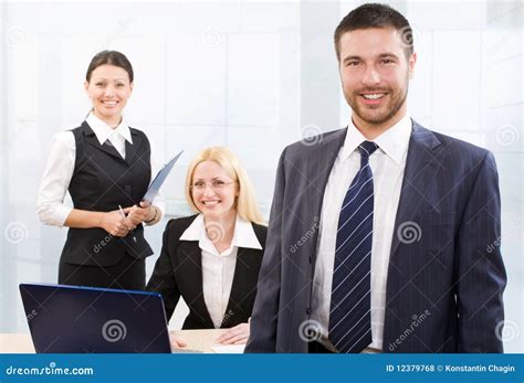Busy white collar workers stock photo. Image of laptop - 12379768