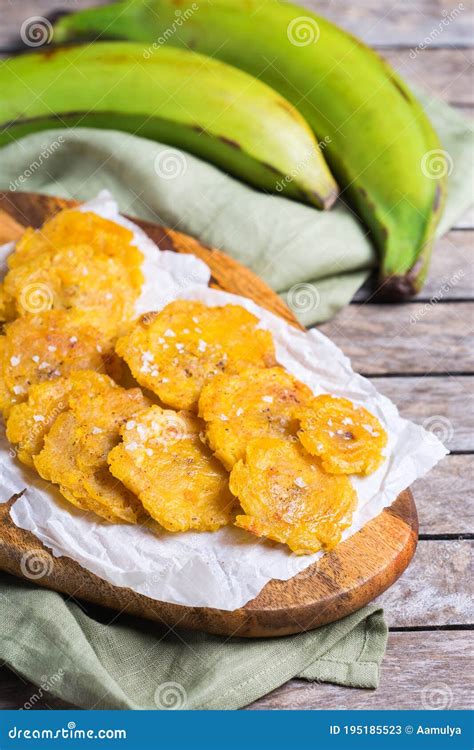 Fried Tostones, Green Plantains, Bananas With Guacamole Sauce Royalty ...
