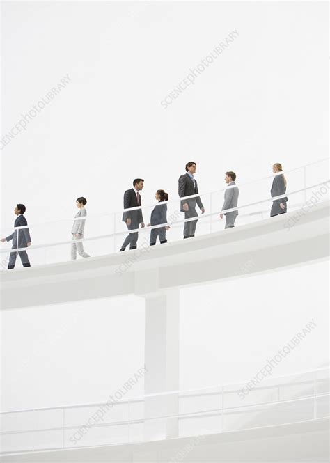 Line of Walking Business People 的图像结果