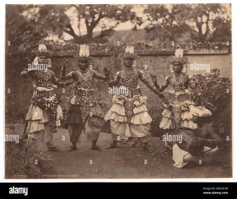 Group of Sinhala devil dancers, Sri Lanka, Charles T. Scowen & Co ...