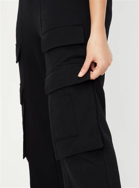 Buy Women Solid Cargo Track Pants Online at just Rs. 999.0 ...